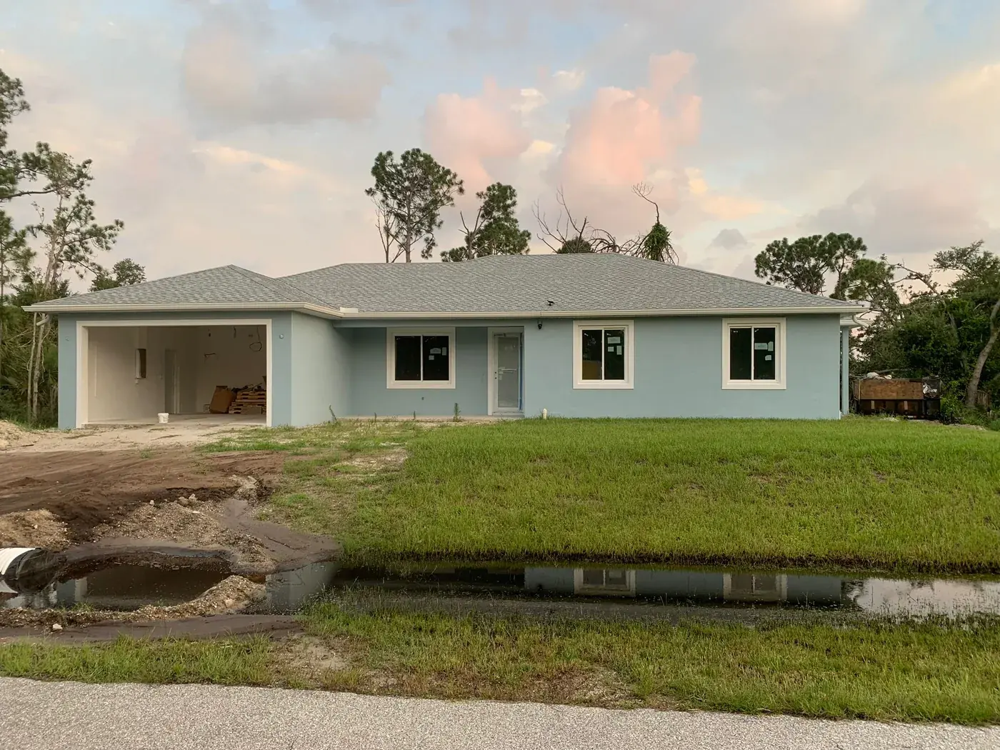 Florida ranch home photographed at dusk after painting
