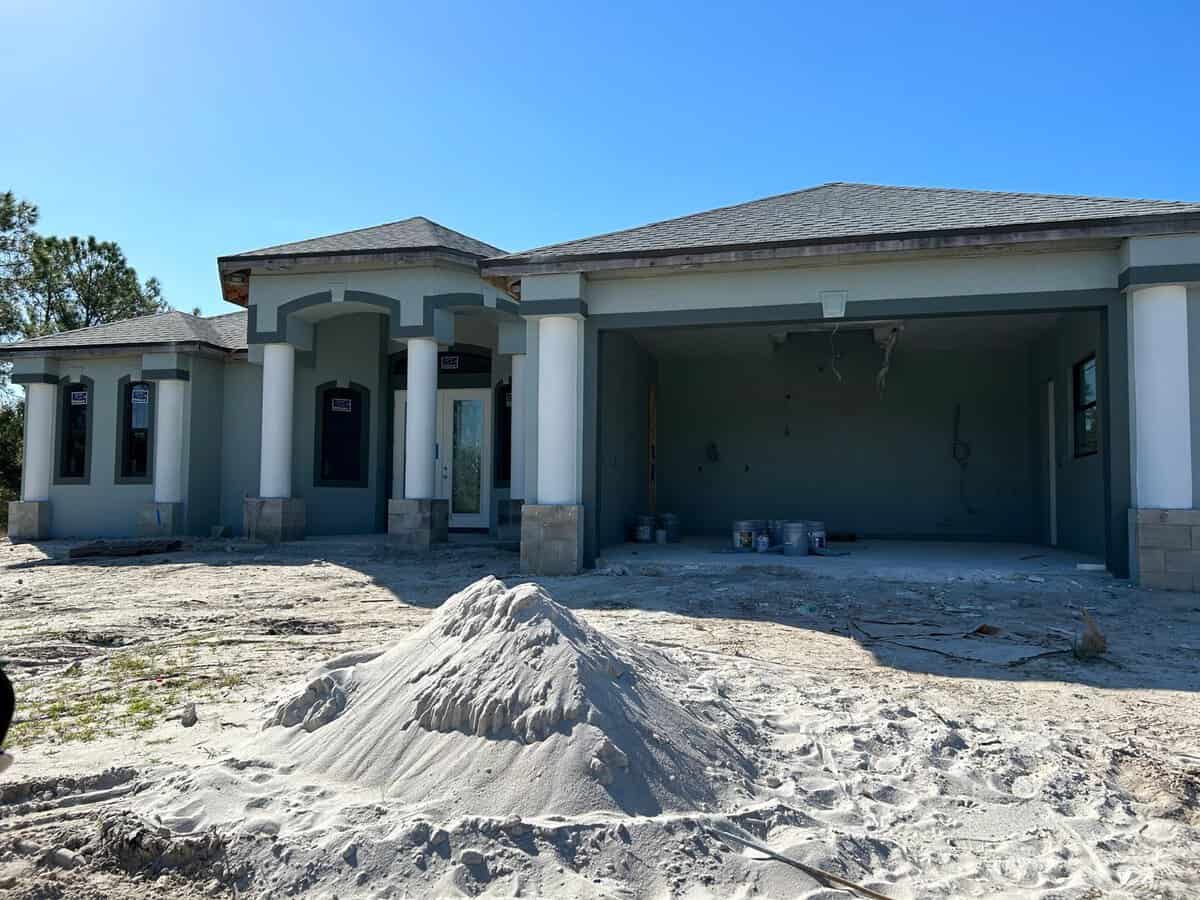 Residential exterior painting in South Florida on newly built home